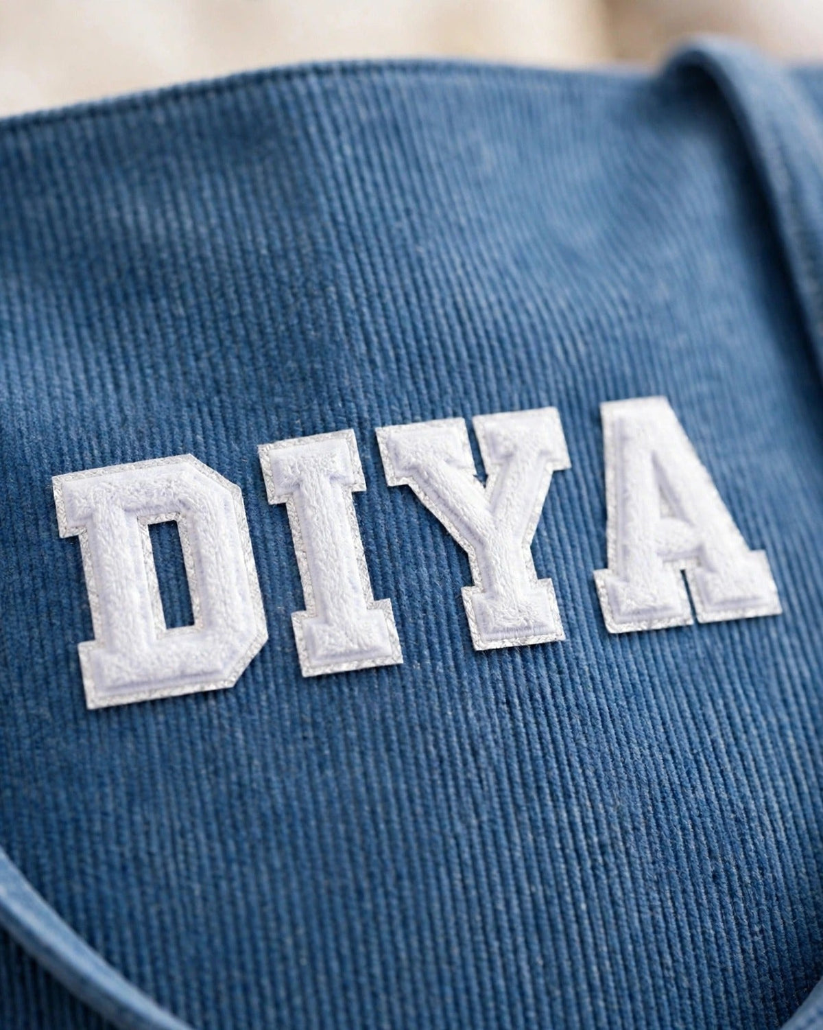 Custom Varsity Letter Corduroy Tote Bag – Denim & White – embroidery close-up