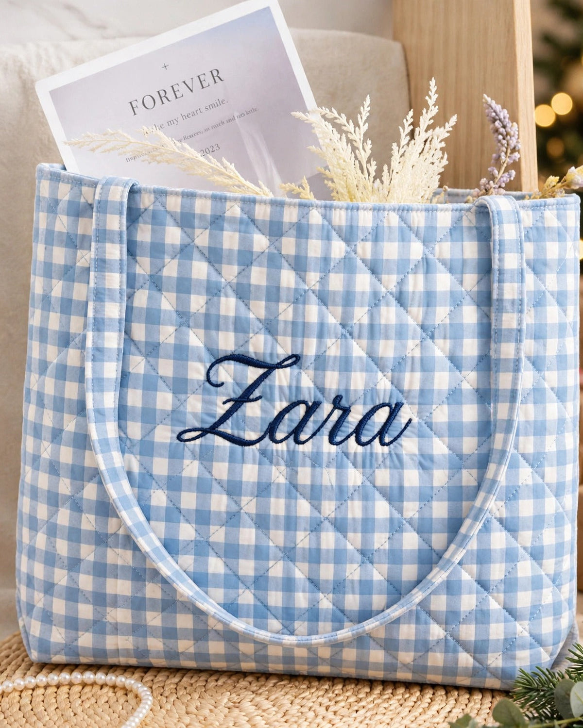 Blue gingham quilted tote with Zara embroidered in navy script