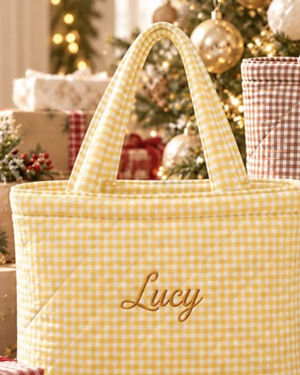 Yellow gingham quilted tote with Lucy embroidered in gold script