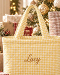 Yellow gingham quilted tote with Lucy embroidered in gold script
