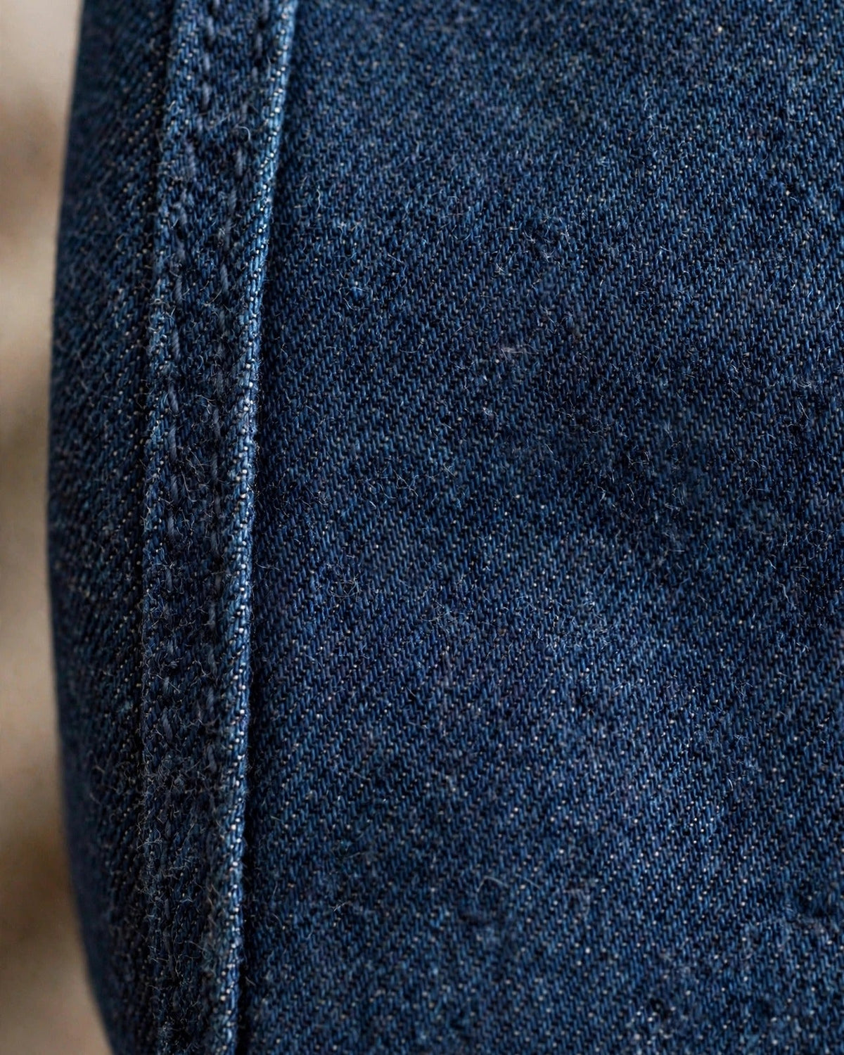Dark denim tote with small pink patch letters – denim fabric texture